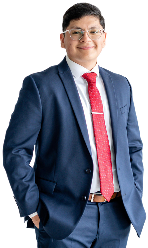 A cutout of Luis in a blue suit with a red tie.